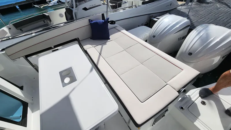 Slide: The Image of 2024 Jeanneau Leader 9.0 WA S2 boat with sunbed and twin Yamaha engines. - 12