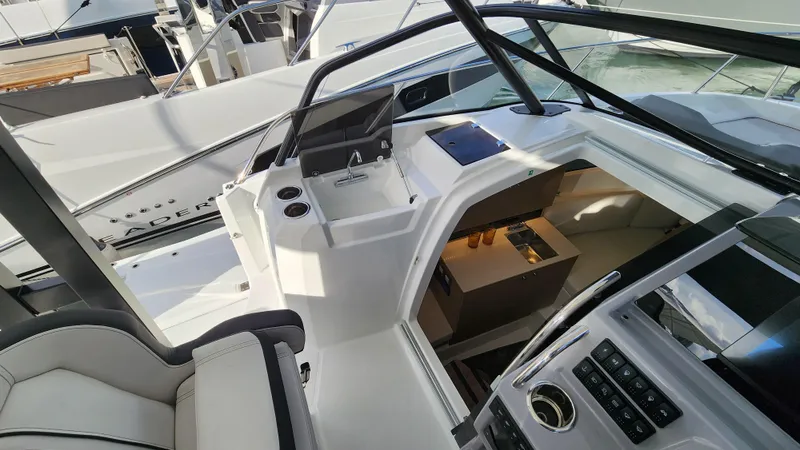 Slide: The Image of 2024 Jeanneau Leader 9.0 WA S2 cockpit and cabin interior view. - 21