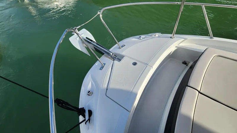 Slide: The Image of 2024 Jeanneau Leader 9.0 WA S2 boat deck with anchor and railing. - 25