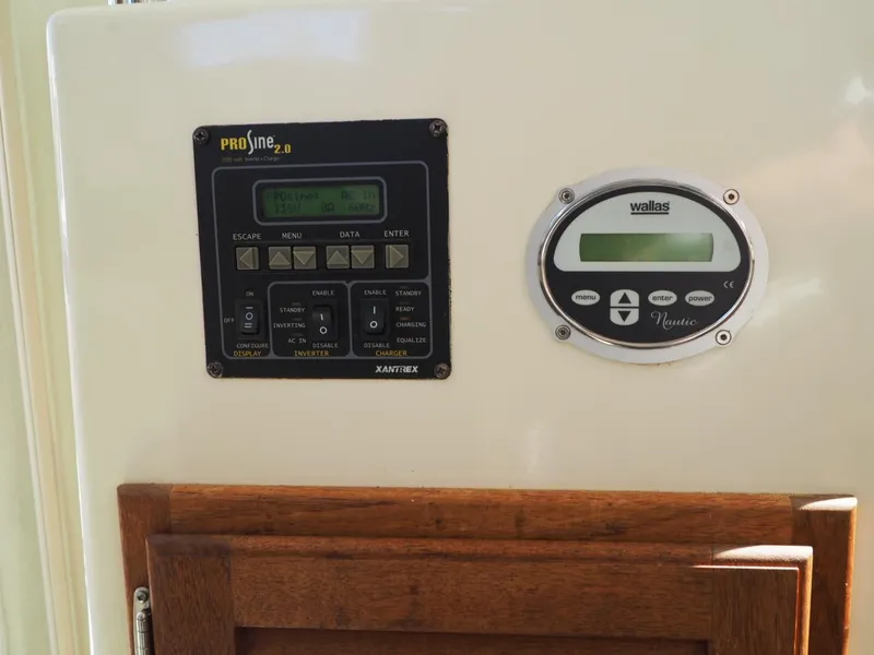 Slide: The Image of Control panels on a 2007 Rosborough 246 Custom Wheel House boat interior. - 18