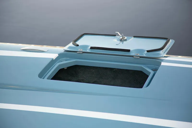 Slide: The Image of Open hatch on a 2025 Fountain 34 Thunder Cat boat. - 13