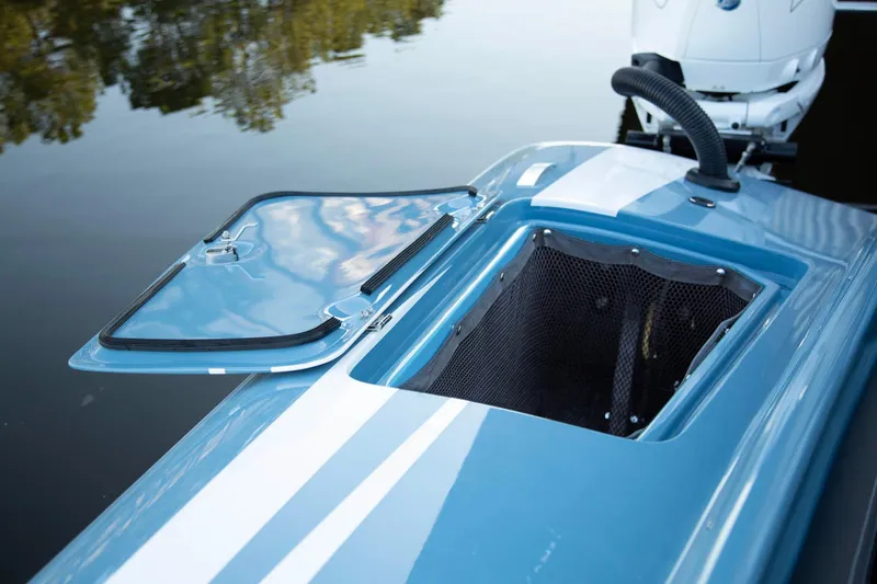 Slide: The Image of 2025 Fountain 34 Thunder Cat boat with open storage compartment. - 14