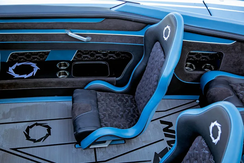 Slide: The Image of 2025 Fountain 34 Thunder Cat interior with blue and black seating. - 6