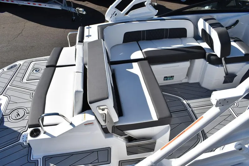 Slide: The Image of 2024 Monterey M-45 boat interior with white and black seating. - 10