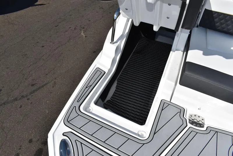 Slide: The Image of 2024 Monterey M-45 boat deck with storage compartment and non-slip flooring. - 15