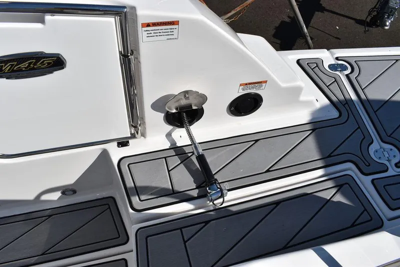Slide: The Image of 2024 Monterey M-45 boat deck with non-slip flooring and safety features. - 17