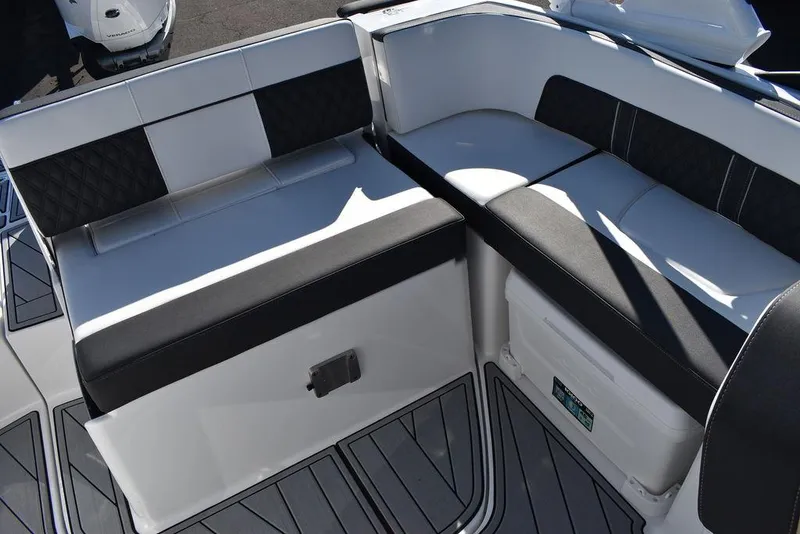 Slide: The Image of 2024 Monterey M-45 boat interior seating with black and white upholstery. - 22