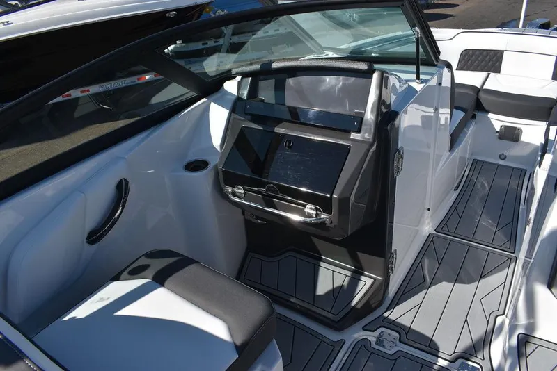 Slide: The Image of 2024 Monterey M-45 boat interior with modern dashboard and seating. - 28
