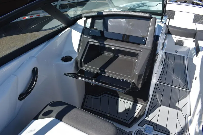 Slide: The Image of 2024 Monterey M-45 boat interior with open storage compartment and seating. - 29
