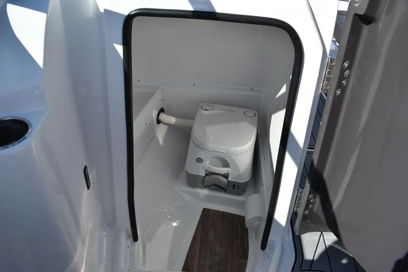 Slide: The Image of 2024 Monterey M-45 boat interior with compact marine toilet. - 31