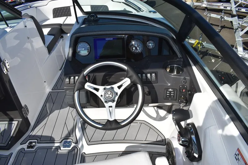 Slide: The Image of 2024 Monterey M-45 boat cockpit with steering wheel and control panel. - 34