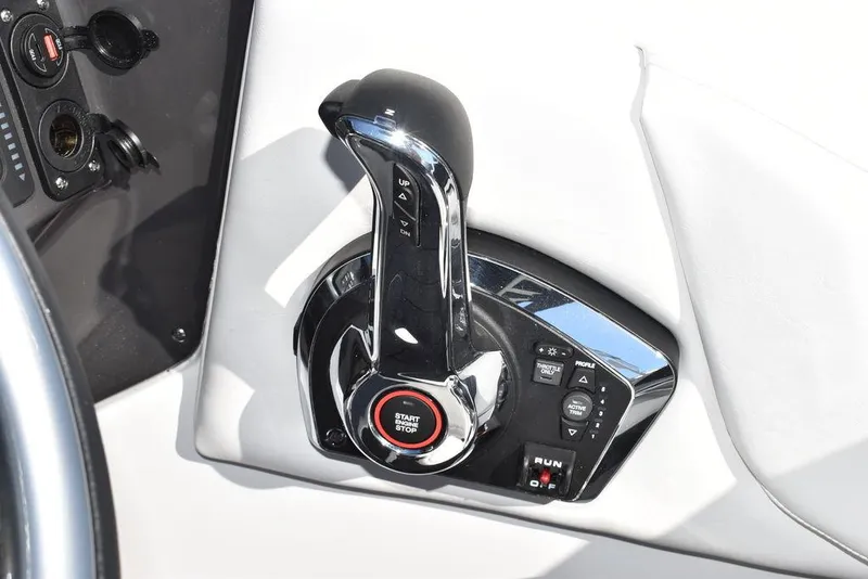 Slide: The Image of 2024 Monterey M-45 boat throttle control with start/stop button and control panel. - 39