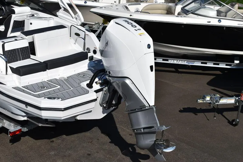 Slide: The Image of 2024 Monterey M-45 boat with powerful outboard motor, sleek design, and spacious seating. - 4