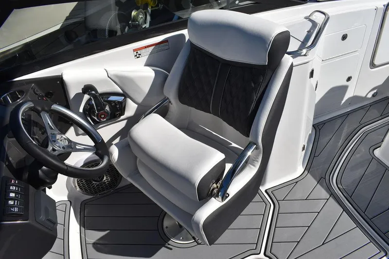 Slide: The Image of Captain's seat and helm of the 2024 Monterey M-45 boat. - 42