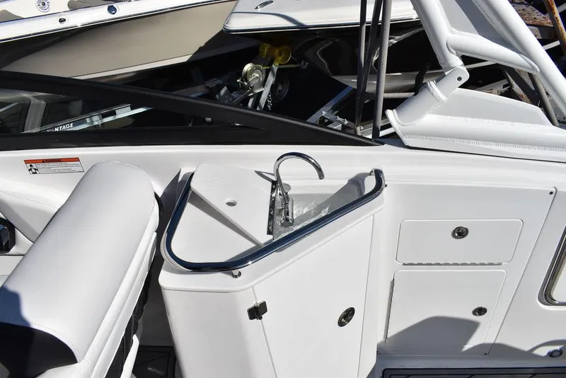 Slide: The Image of 2024 Monterey M-45 boat interior with sink and storage compartments. - 43