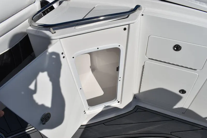 Slide: The Image of Open storage compartment on a 2024 Monterey M-45 boat. - 45