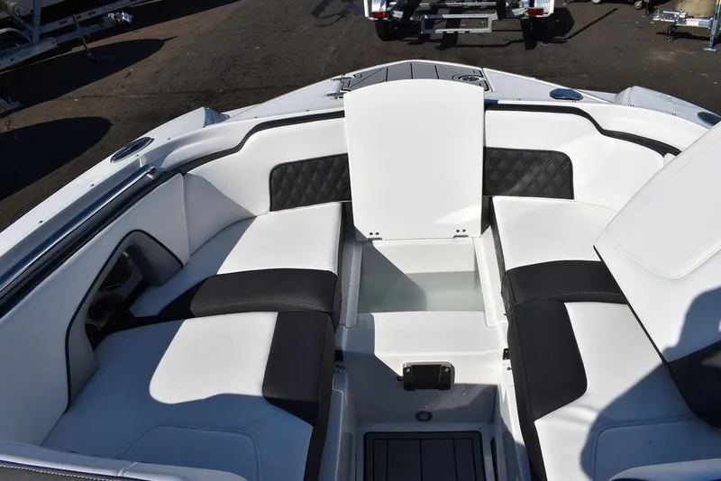 Slide: The Image of 2024 Monterey M-45 boat interior with white and black seating. - 47