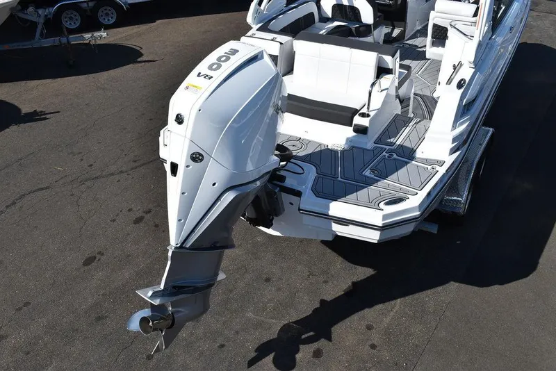 Slide: The Image of 2024 Monterey M-45 boat with powerful outboard motor, sleek design, and spacious seating. - 5