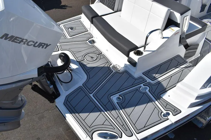 Slide: The Image of 2024 Monterey M-45 boat deck with Mercury engine and cushioned seating. - 7