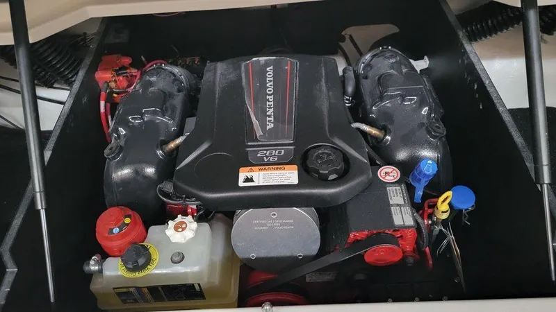 Slide: The Image of 2024 Regal LS2 engine compartment featuring a Volvo Penta 280 V6 engine. - 13