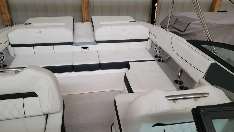 Slide: The Image of 2024 Regal LS2 boat interior with white seating and modern design. - 3