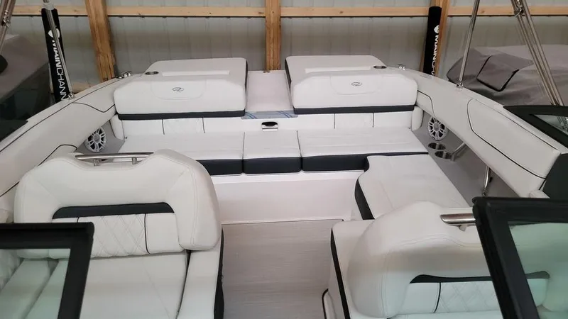 Slide: The Image of 2024 Regal LS2 boat interior with white seating and modern design. - 7