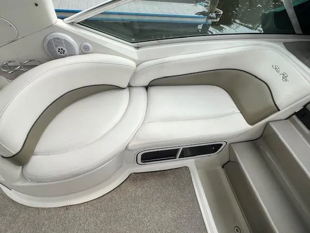 Slide: The Image of 2005 Sea Ray 260 Sundancer boat interior seating area. - 12