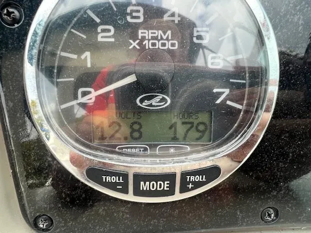 Slide: The Image of Close-up of 2005 Sea Ray 260 Sundancer tachometer showing 179 hours and 12.8 volts. - 20