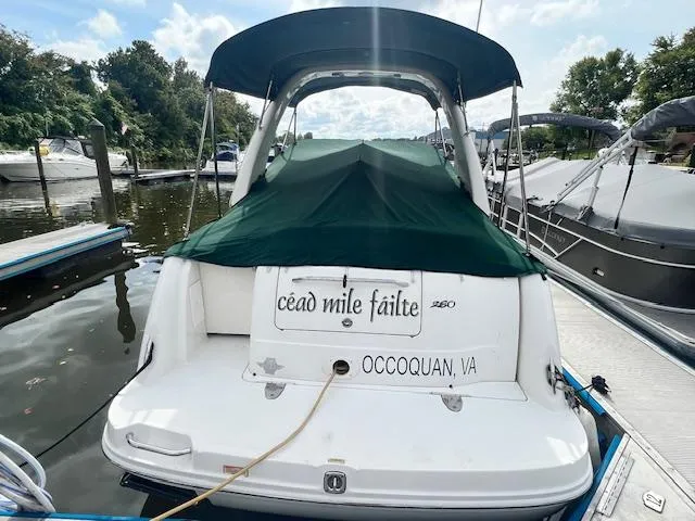 Slide: The Image of 2005 Sea Ray 260 Sundancer boat docked in Occoquan, VA with green cover. - 3
