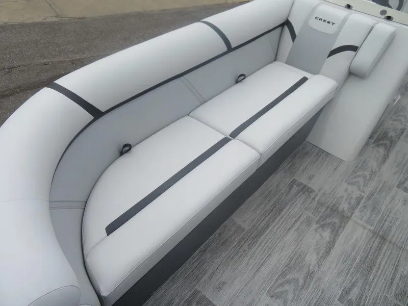 Slide: The Image of 2024 Crest Classic LX 240 SLRC boat interior with sleek, modern seating and stylish design. - 3