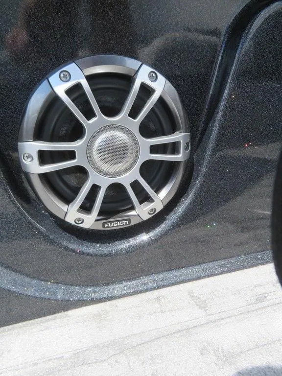 Slide: The Image of 2024 Crest Caribbean RS 250 SLS speaker detail with Fusion audio system. - 6