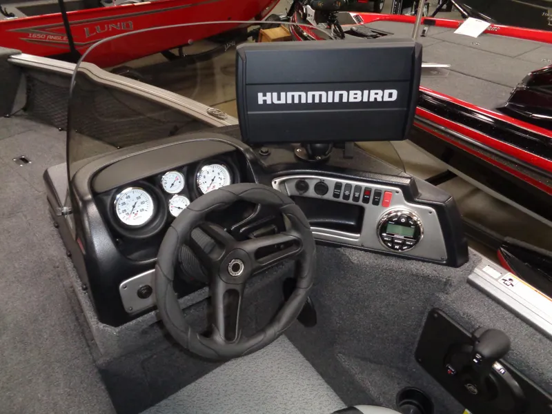 Slide: The Image of 2024 Lund 1875 Impact XS SS boat interior with four seats. - 14