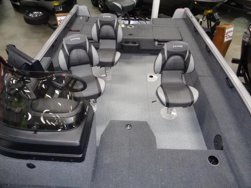 Slide: The Image of 2024 Lund 1875 Impact XS SS boat with Minn Kota trolling motor. - 21