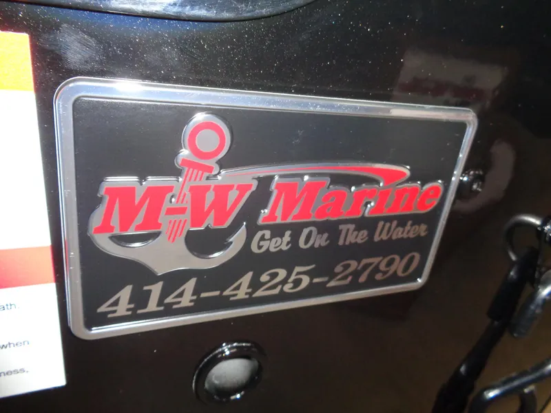 Slide: The Image of 2024 Lund 1875 Impact XS SS boat details at Hales Corners Home Show. - 27