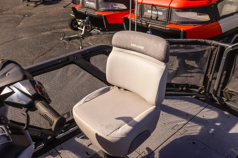 Slide: The Image of 2024 Sea-Doo Switch 16 boat seat with steering console, showcasing modern design. - 10