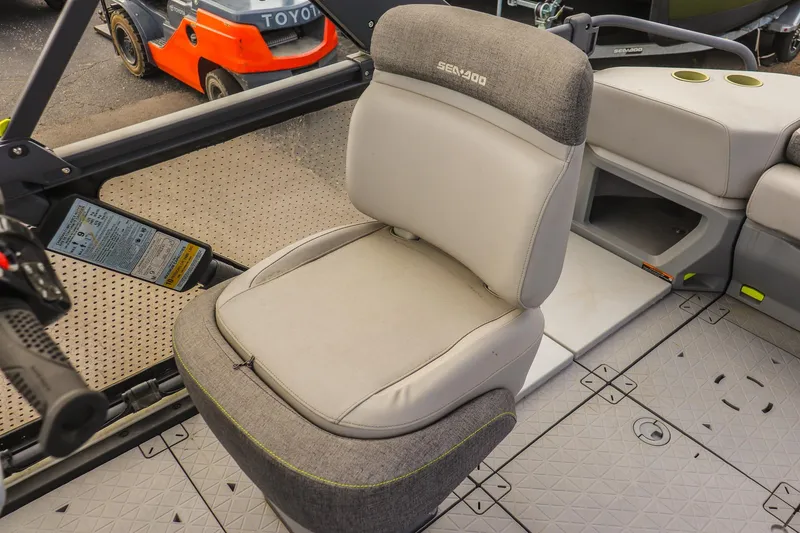 Slide: The Image of 2024 Sea-Doo Switch Sport 21 interior seat with gray upholstery and modern design. - 11