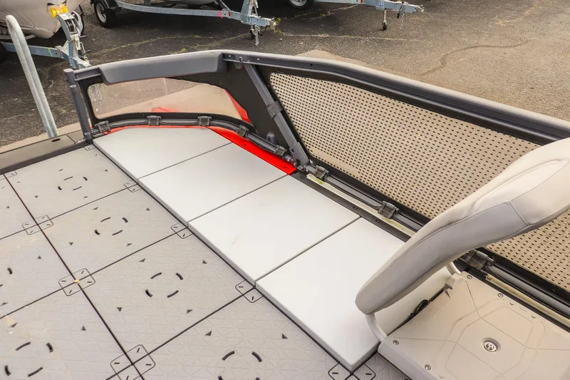 Slide: The Image of 2024 Sea-Doo Switch Sport 21 interior seating and deck design. - 12