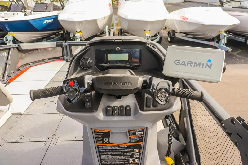 Slide: The Image of 2024 Sea-Doo Switch Sport 21 dashboard with Garmin navigation system. - 18