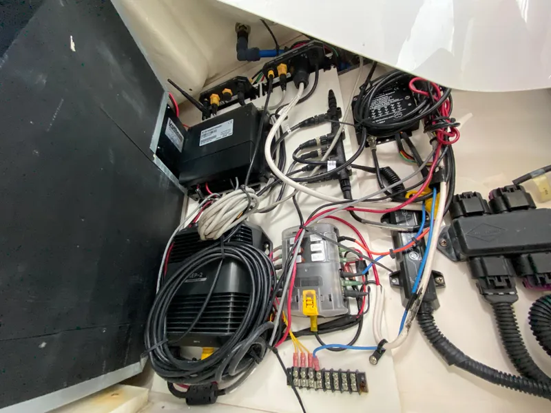 Slide: The Image of Electrical wiring and components inside a 2004 Regal 3860 Commodore boat. - 20