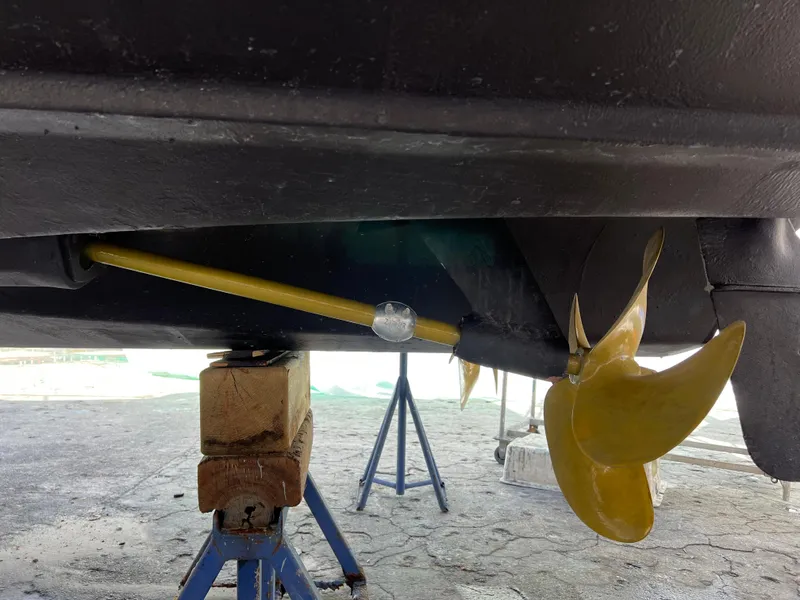 Slide: The Image of Close-up of 2004 Regal 3860 Commodore propeller and shaft during maintenance. - 31