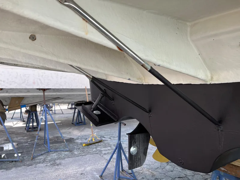 Slide: The Image of Close-up of 2004 Regal 3860 Commodore boat hull on stands. - 34