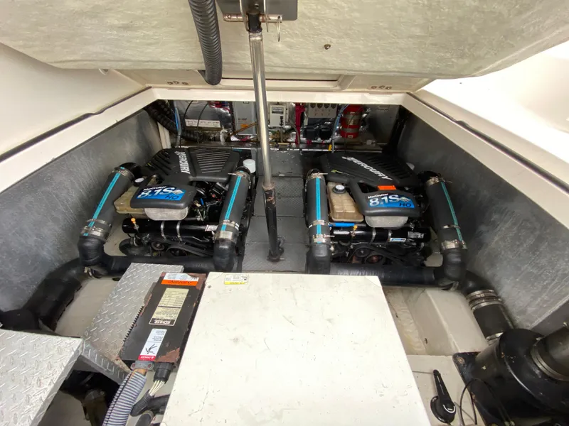 Slide: The Image of 2004 Regal 3860 Commodore engine compartment with twin engines. - 4