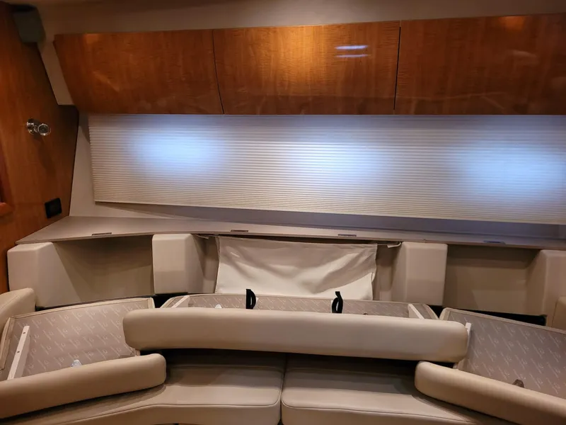 Slide: The Image of Interior seating area of a 2004 Regal 3860 Commodore yacht. - 43