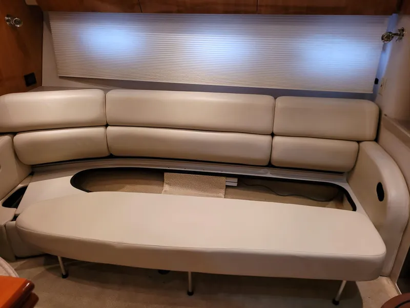 Slide: The Image of 2004 Regal 3860 Commodore yacht interior with beige leather seating. - 47