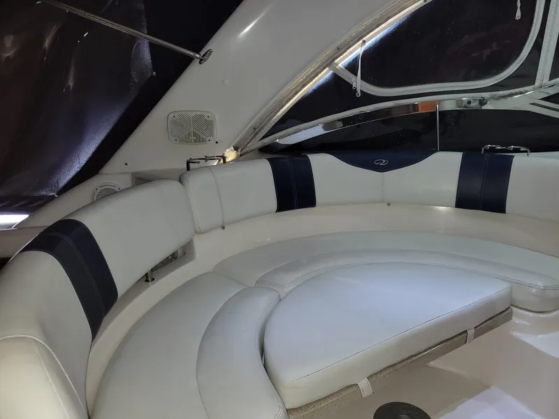 Slide: The Image of Luxurious seating area on a 2004 Regal 3860 Commodore yacht. - 49
