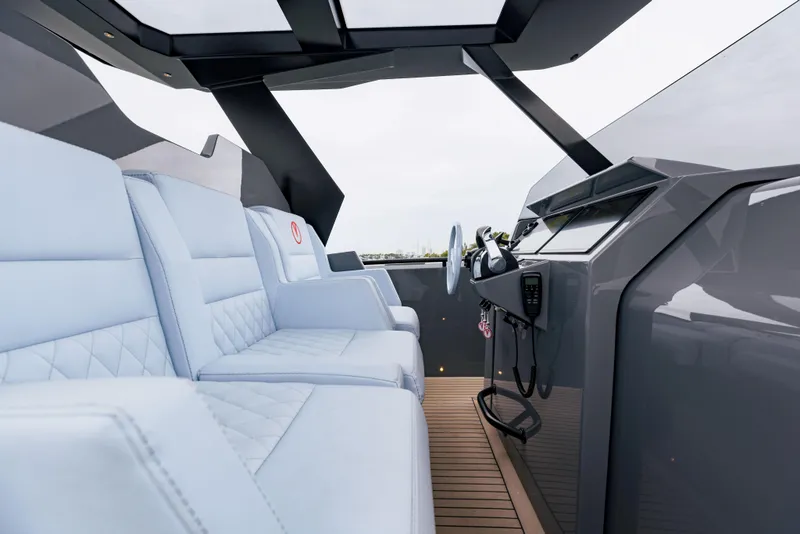 Slide: The Image of Interior of 2022 Vanquish Yachts VQ40 with modern helm and luxurious seating. - 14