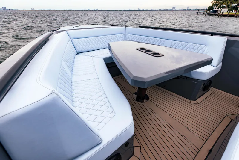 Slide: The Image of Luxurious seating area on the 2022 Vanquish Yachts VQ40 with diamond-stitched upholstery. - 4