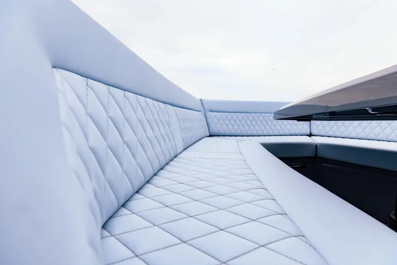 Slide: The Image of Luxurious seating on the 2022 Vanquish Yachts VQ40 with diamond-stitched upholstery. - 5