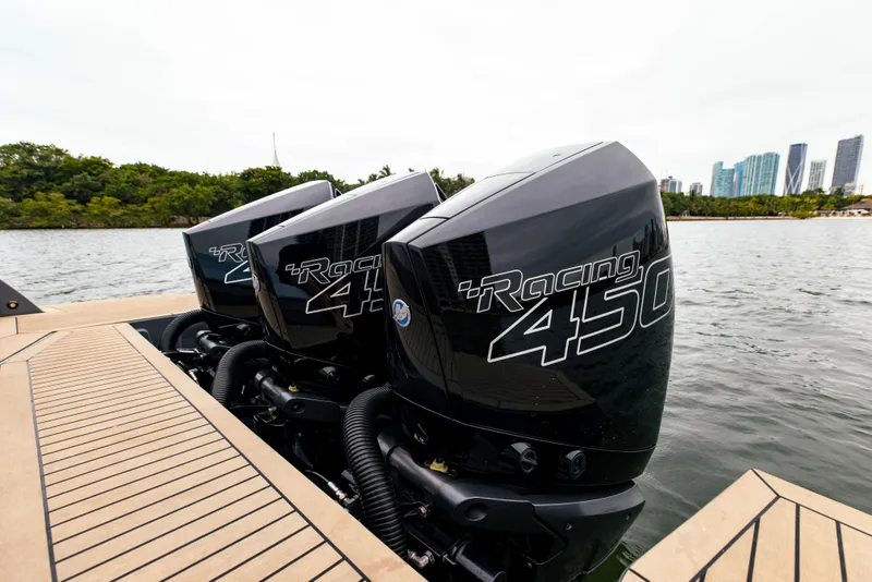 Slide: The Image of Triple Mercury Racing 450 engines on a 2022 Vanquish Yachts VQ40 boat. - 9
