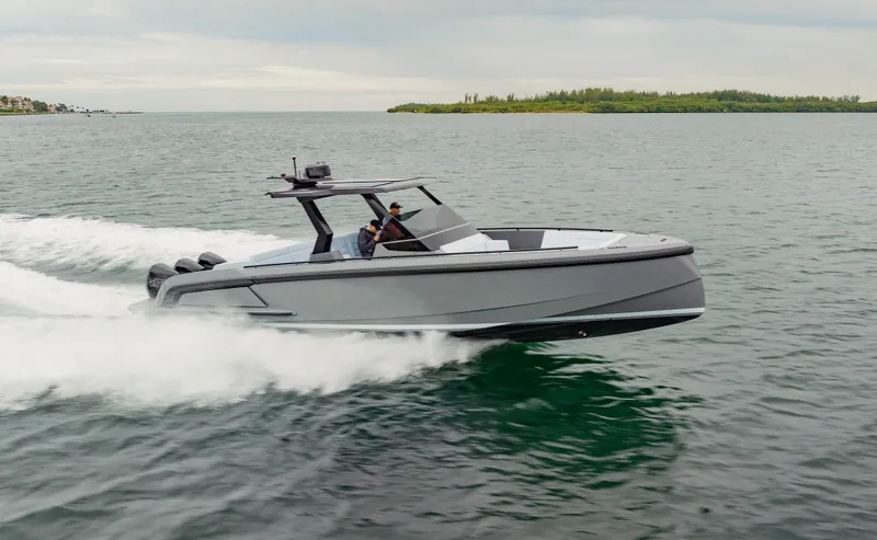The Image of 2022 Vanquish Yachts VQ40 cruising on open water. - 1